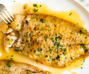 whole flash fried fish with spring onion garlic and ginger